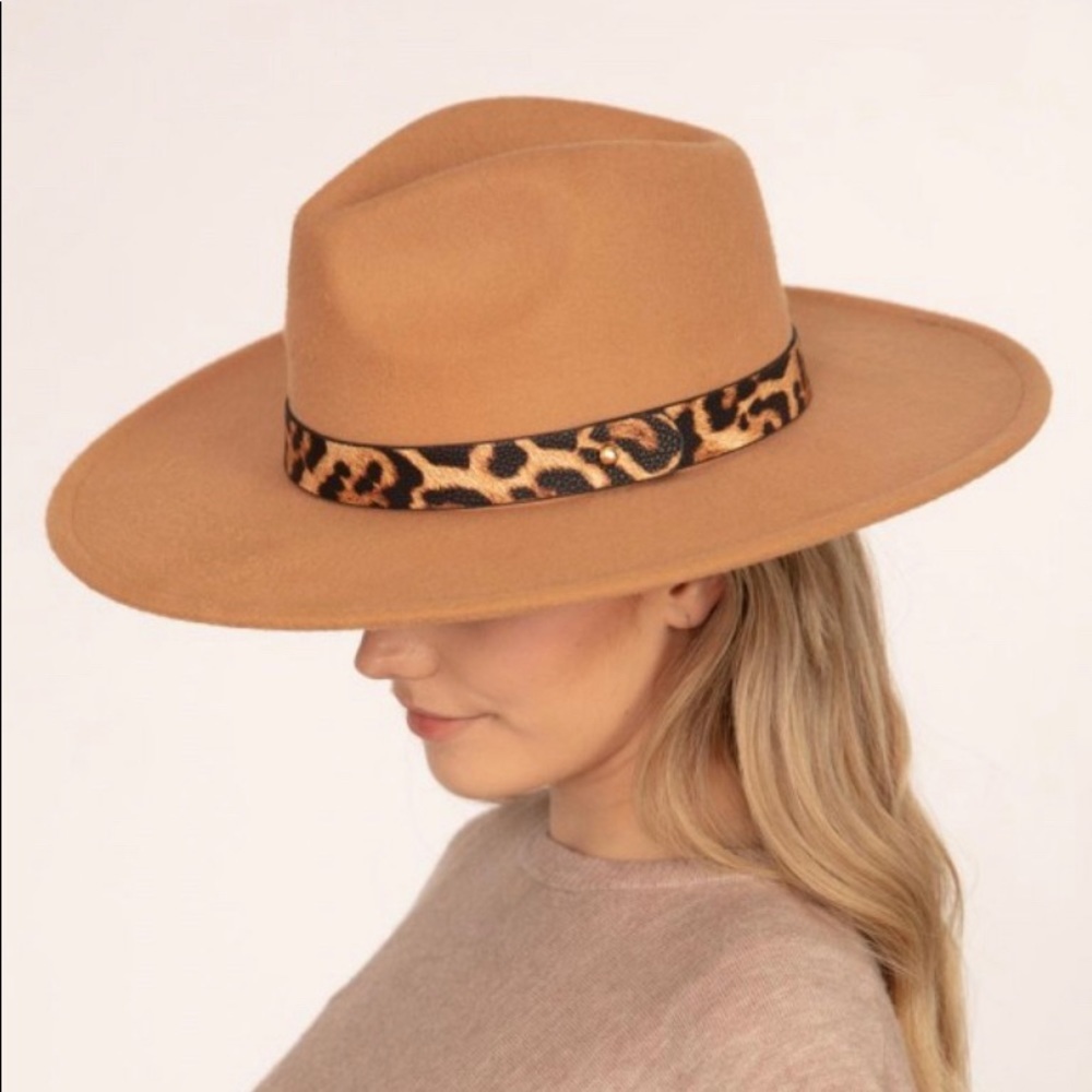 Taupe felt Panama Hat featuring faux animal print leather band.
